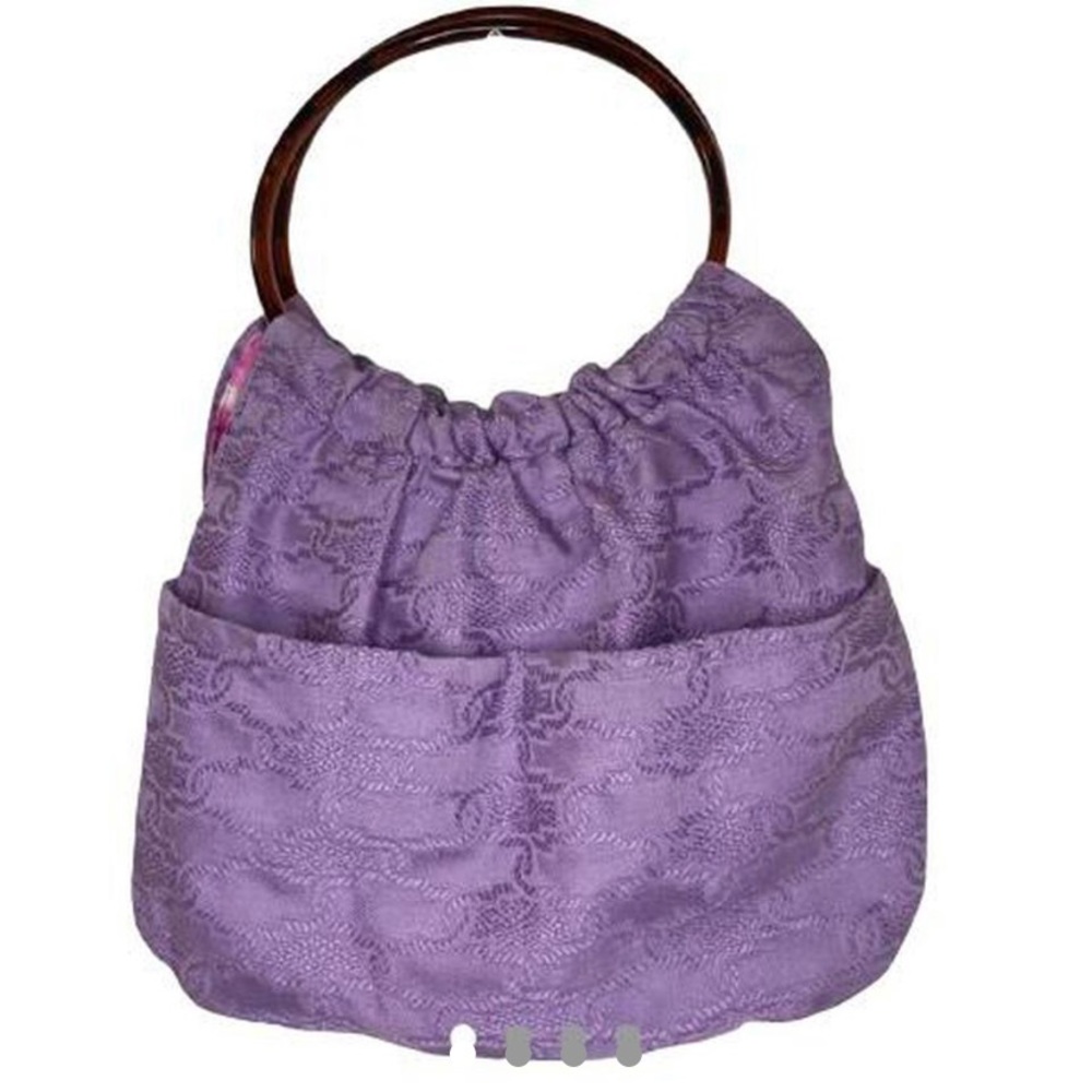 Urban renewal lilac handbag with brown handles 
Pink & white tye dye inside